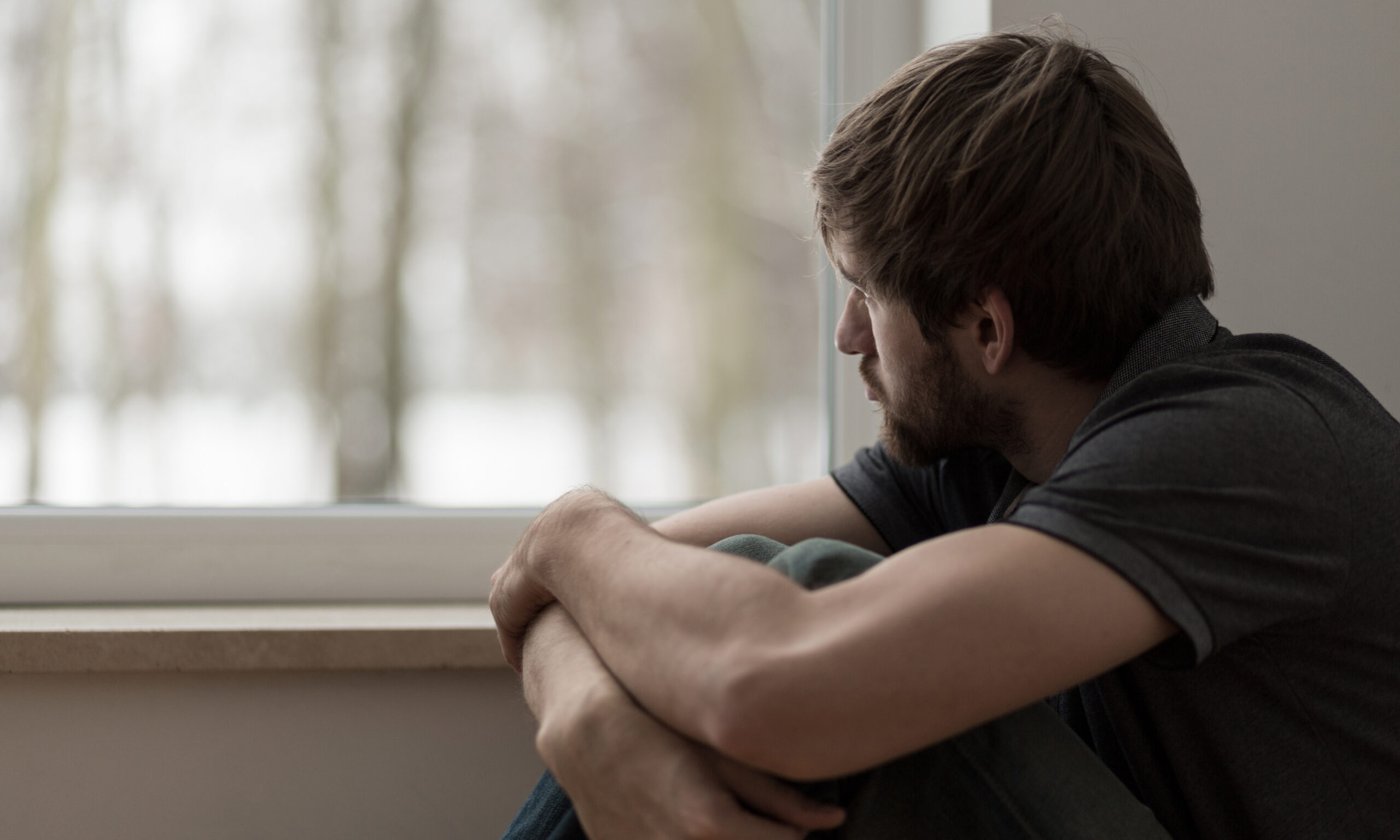 man struggling with depression